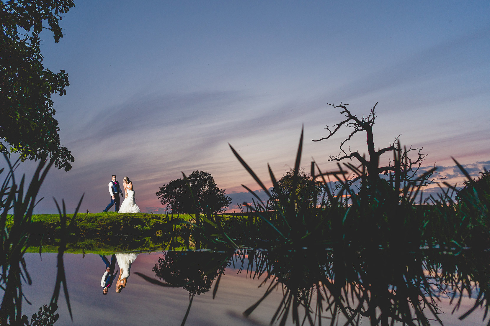 Matthew and sue laughing on their wedding day at southwood ahll