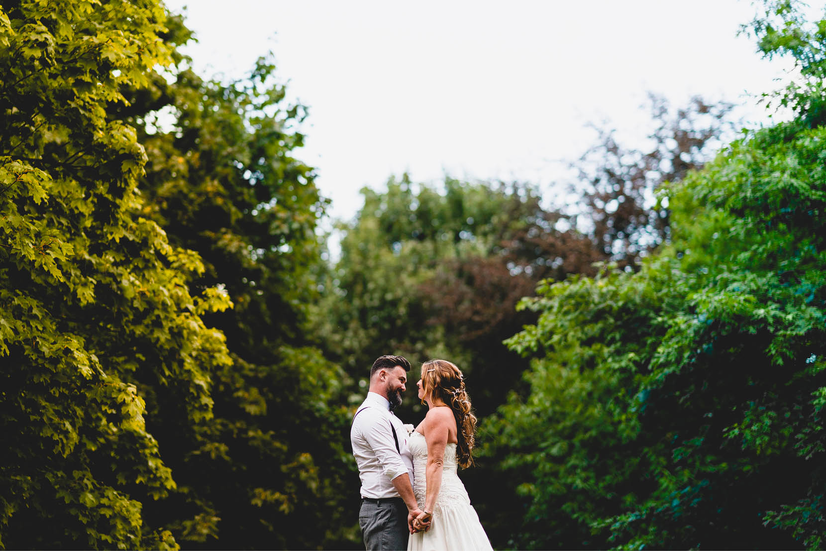 parkhill hotel wedding matthew and emma having a snuggle in the grounds during golden hour